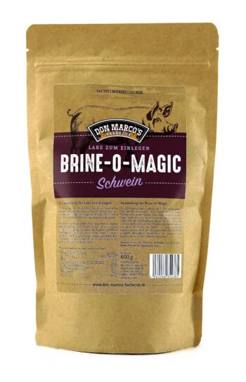 Schwein Brine O Magic in braunem Kraftpapier Beutel. Großes Etikett in Front mit gezeichnetem Schwein im Hintergrund