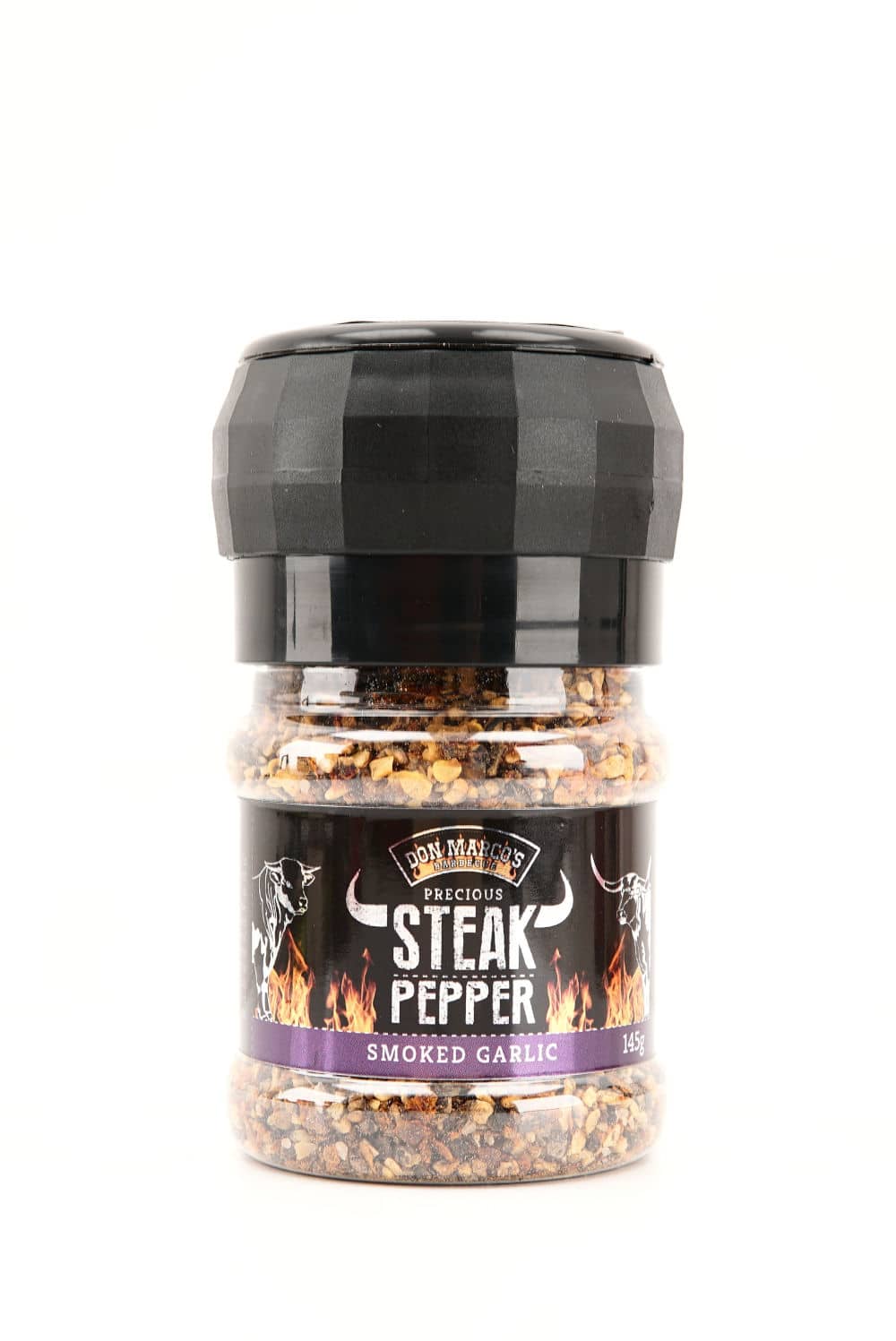 smoked garlic steak pfeffer in transparenter PET Dose, schwarzes Etikett mit Produktname und Hörnern in Front, schwarze Deckelmühle